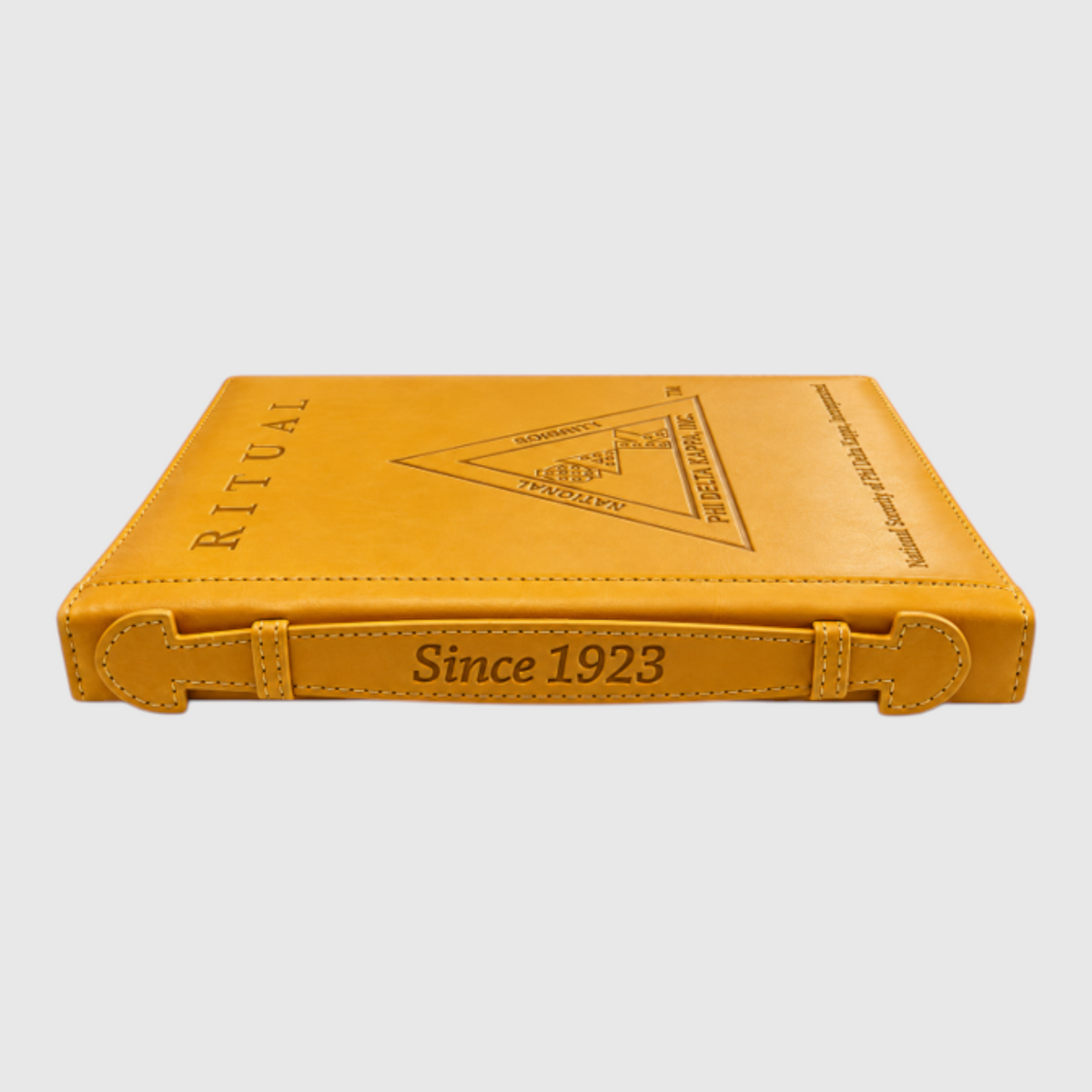 Pat Goffe Collections gold ritual book with embossed Phi Delta Kappa logo and Since 1923 text on the spine