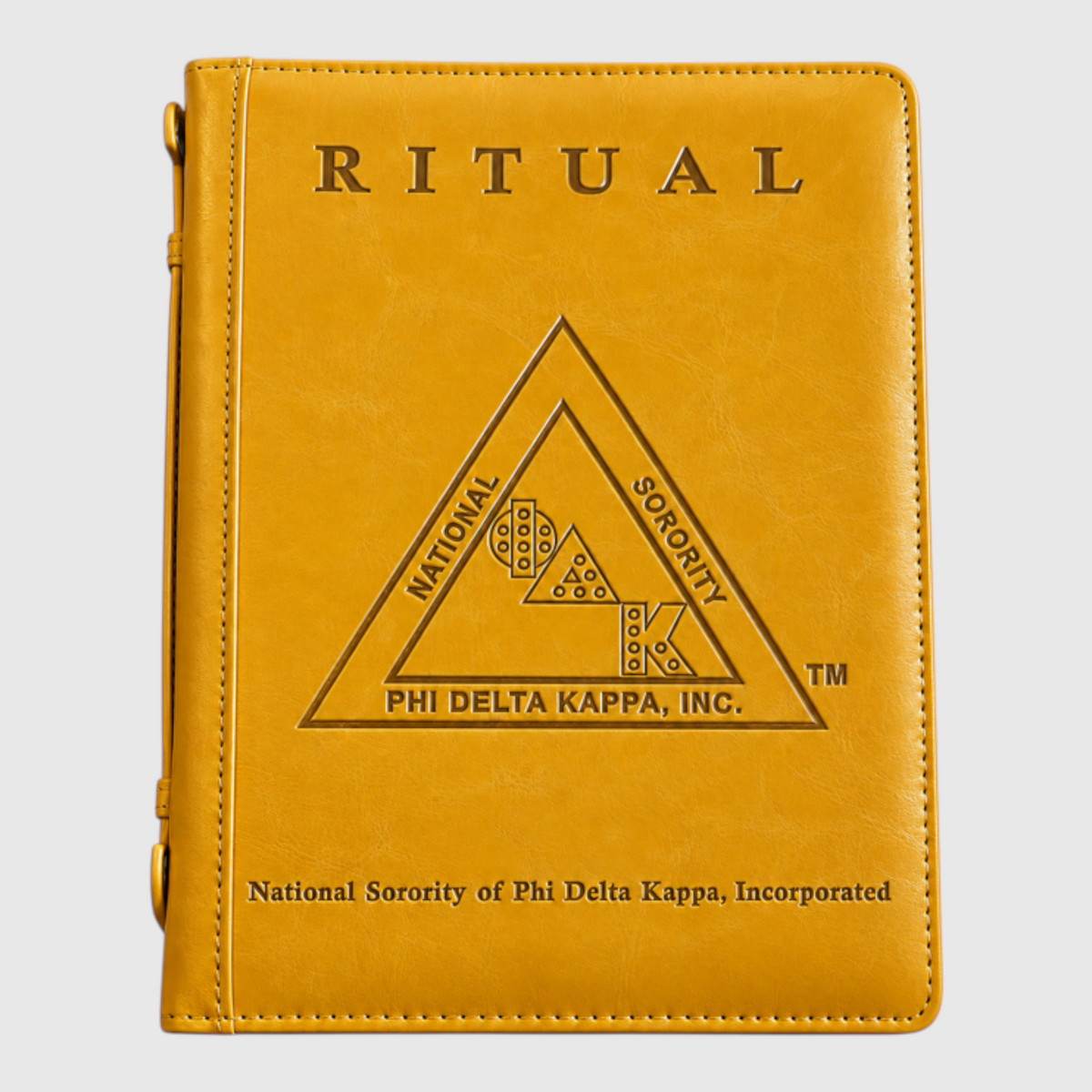 Pat Goffe Collections gold leather ritual book with embossed Phi Delta Kappa National Sorority logo and lettering