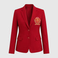 Pat Goffe Collections red tailored blazer featuring an embroidered NSPDK crest and custom branded buttons.
