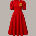Pat Goffe Collections red midi fit-and-flare dress with flutter sleeves, waist belt, and embroidered NSPDK crest.