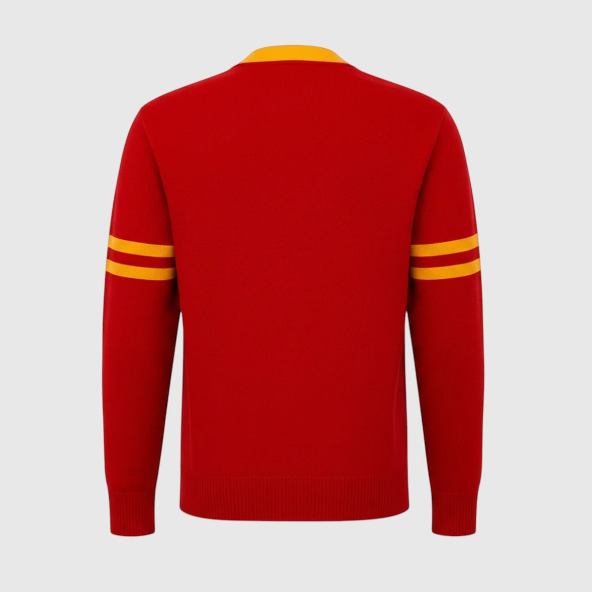 Back view of Pat Goffe Collections red knit cardigan featuring gold striped sleeve detailing and ribbed hem.