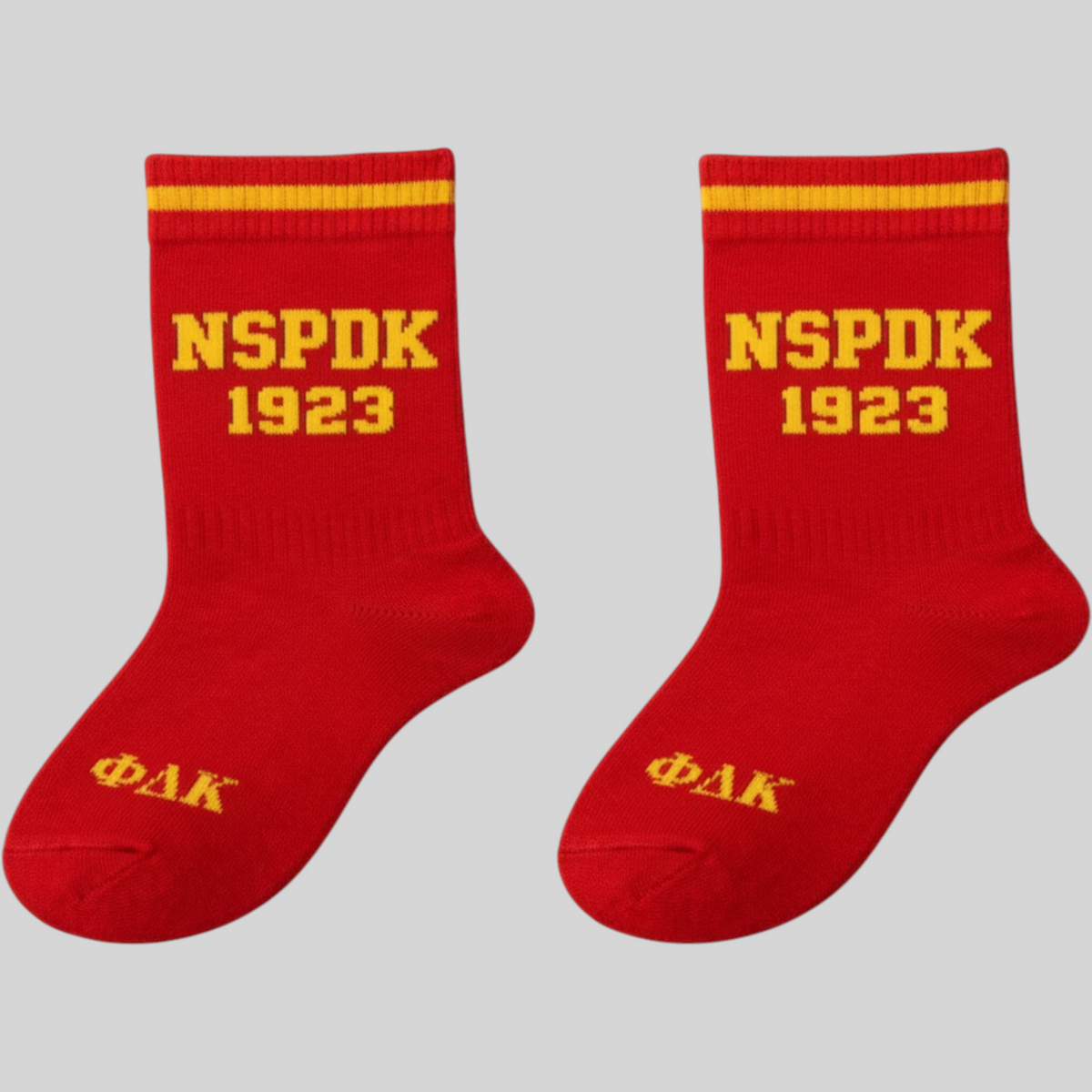 Pat Goffe Collections red crew socks with yellow striped cuffs and NSPDK 1923 and ΦΔΚ lettering