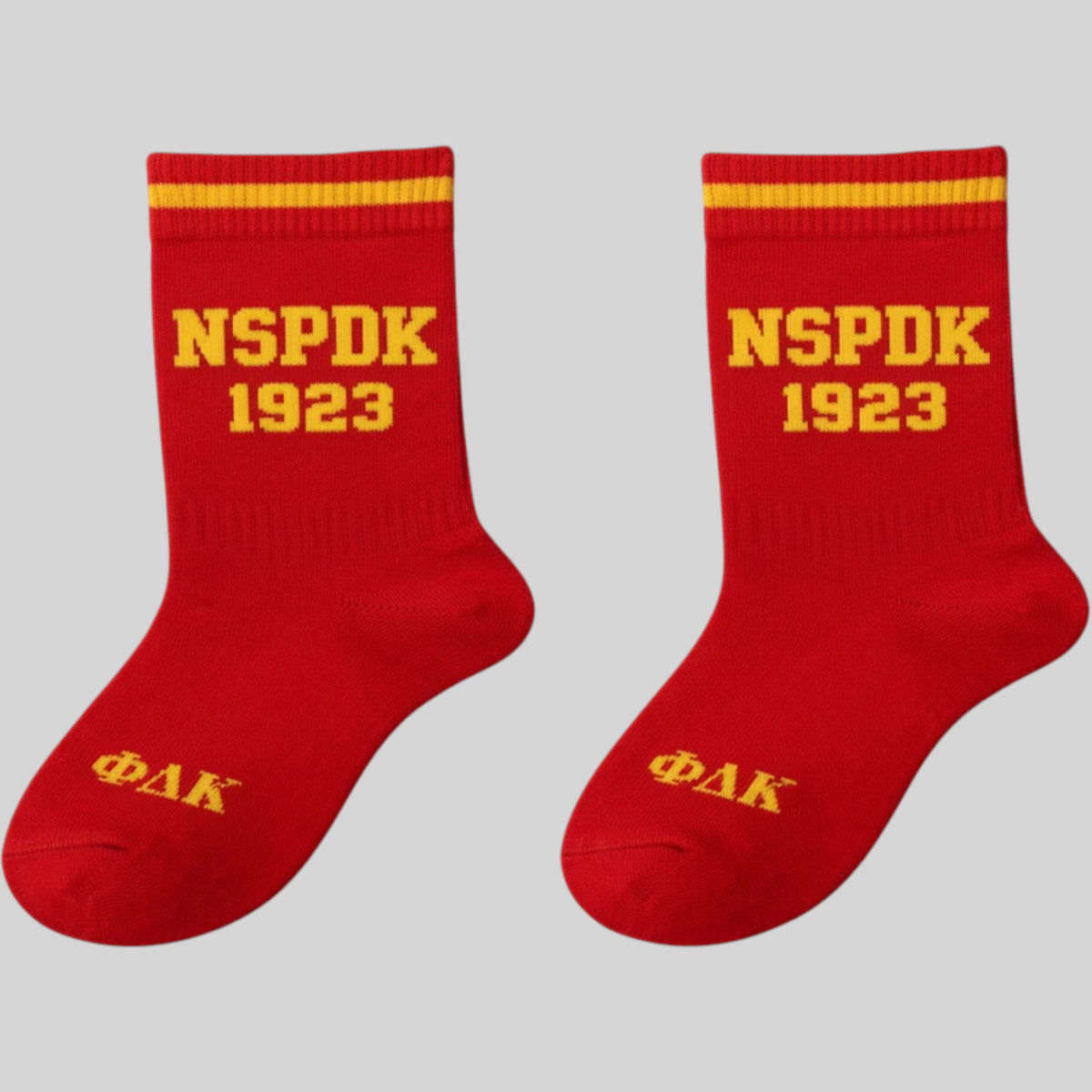 Pat Goffe Collections red crew socks with yellow NSPDK 1923 lettering and ΦΔΚ Greek letter detailing