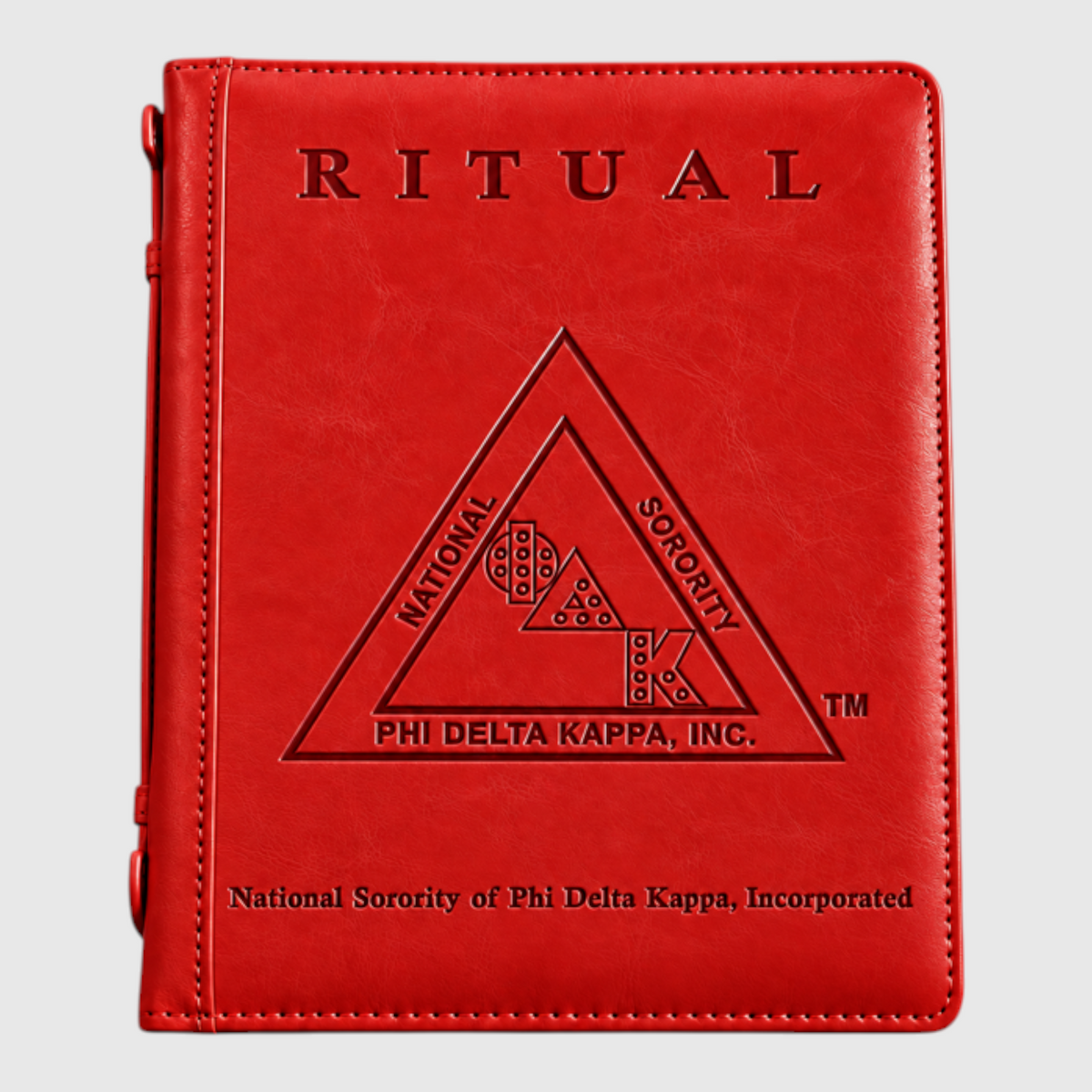Pat Goffe Collections red leather ritual book featuring the embossed Phi Delta Kappa National Sorority logo