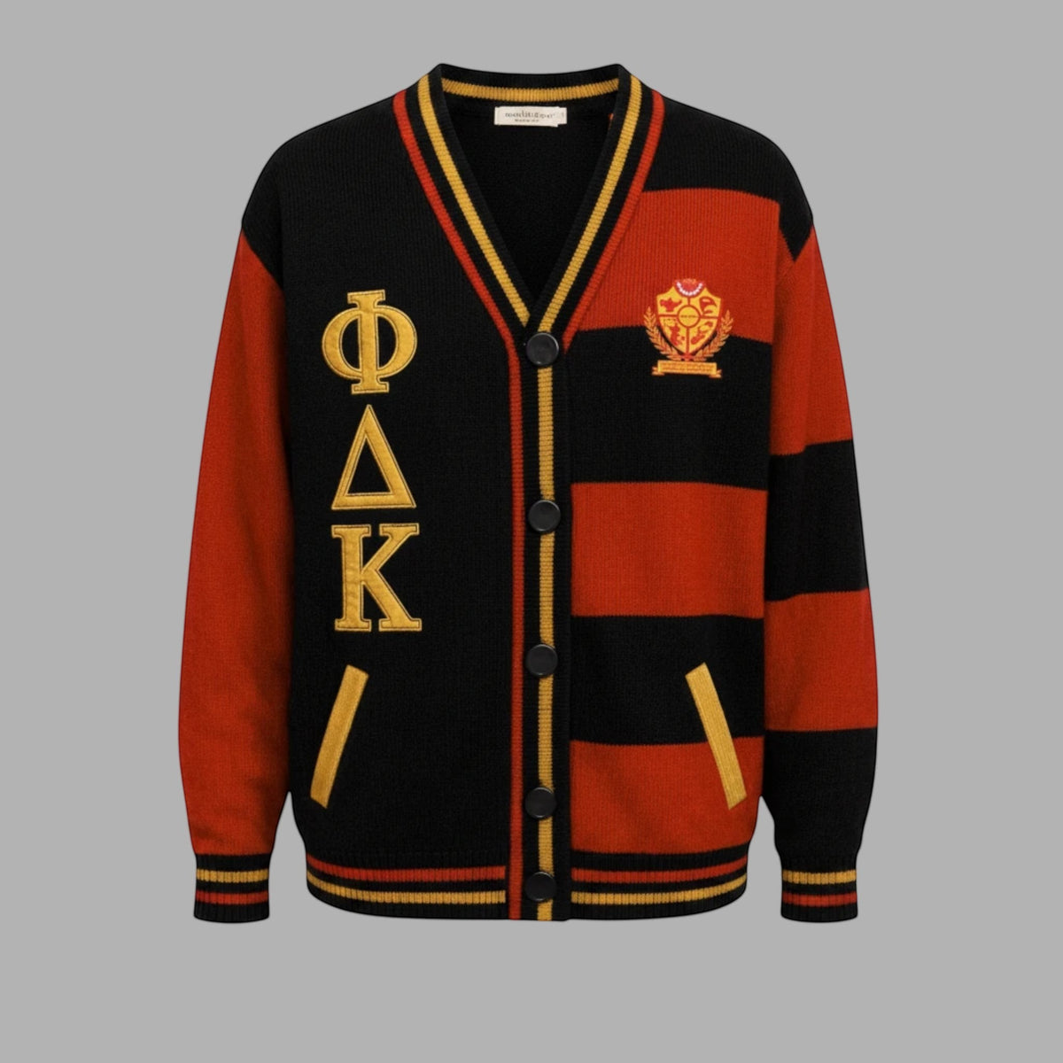 Pat Goffe Collections soft knit cardigan in black and red stripes with gold Greek letter embroidery and crest patch.